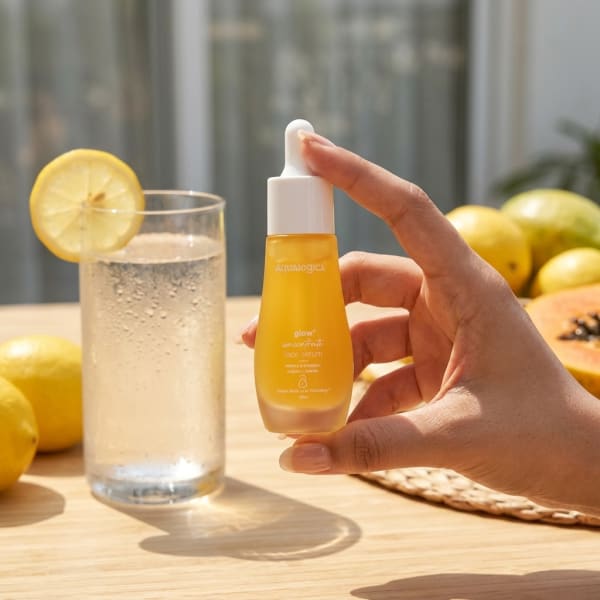 Aqualogica FREEBIE Glow+ Concentrate Face Serum 30 ml held in hand, candid photo