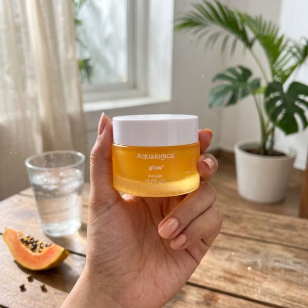 Aqualogica FREEBIE Glow+ Mousse Night Gel 50 g held in hand, candid photo