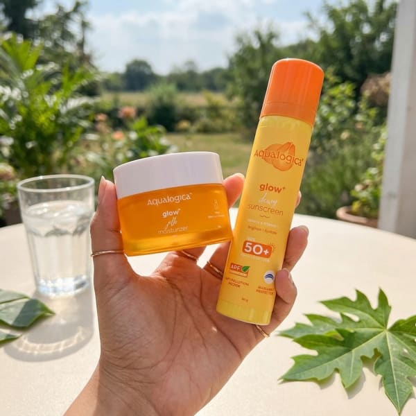 Aqualogica Glow+ Protect & Glow BFFs held in hand, candid photo