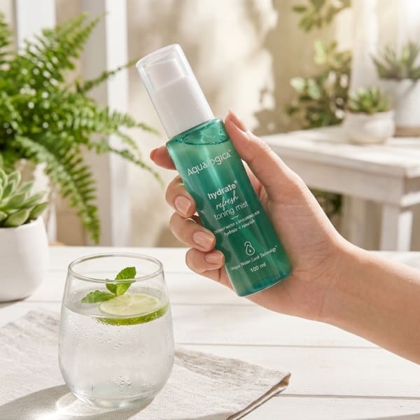 Aqualogica Hydrate+ Refresh Toning Mist, 100 ml held in hand, candid photo