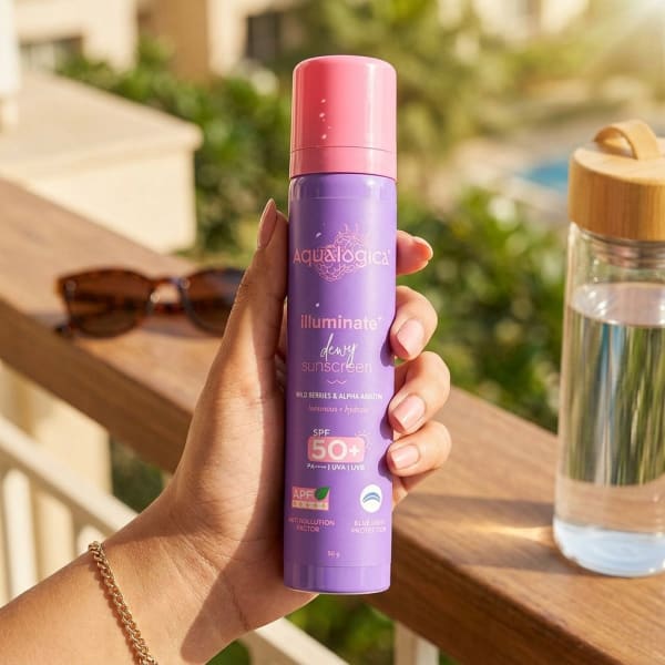 Aqualogica Illuminate+ Dewy Sunscreen In-Vivo Tested SPF 50+ PA++++ with Wild Berries & Alpha Arbutin - 50 g held in hand, candid photo