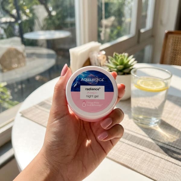 Aqualogica FREEBIE Radiance+ Mousse Night Gel, 15g held in hand, candid photo