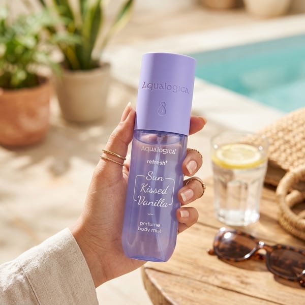 Aqualogica Refresh+ Sun Kissed Vanilla Perfume Body Mist with Zemea & Hyaluronic Acid - 150 ml held in hand, candid photo
