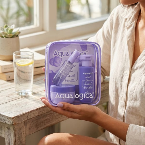 Aqualogica Refresh+ Body Care Set- Sun Kissed Vanilla held in hand, candid photo