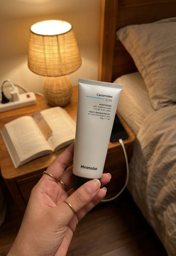 Minimalist Ceramides 0.3% + Madecassoside Moisturizer held in hand, candid photo