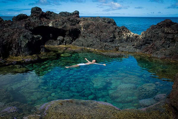 take a dip in tidal pool Rapa Nui