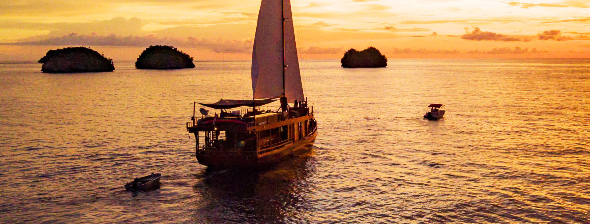 Sailing ship at sunset