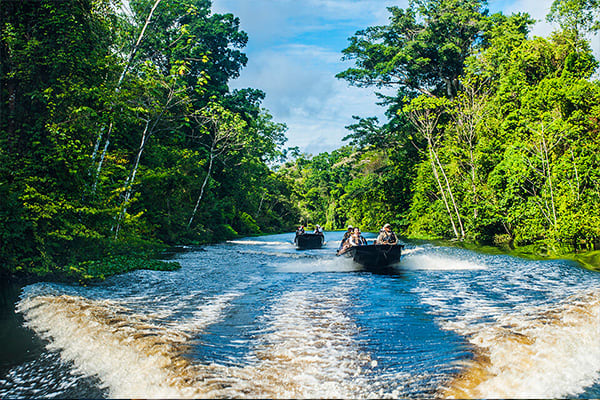 Skiffs Cruising Amazon