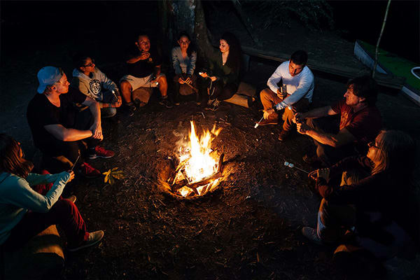 Campfire people having fun in the amazon