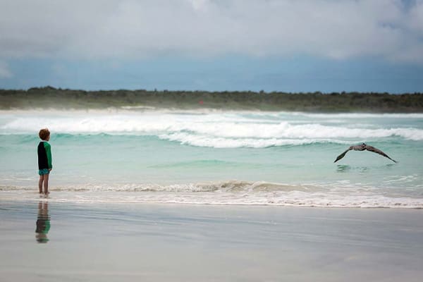 Boy on Beach Galapagos