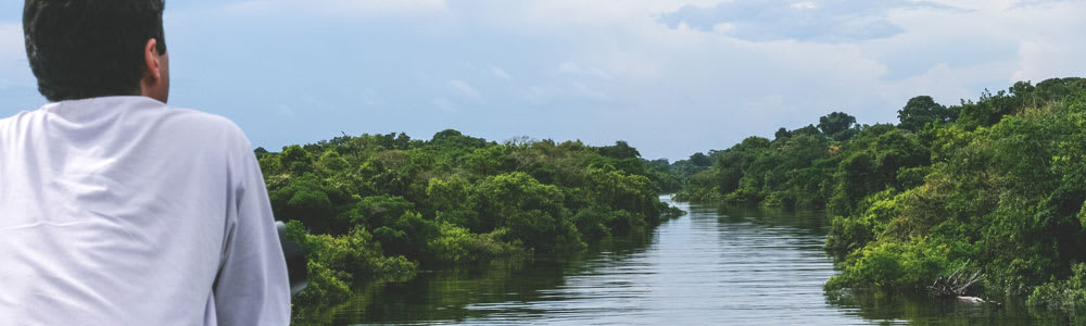 Solo traveler on a boat on the Amazon