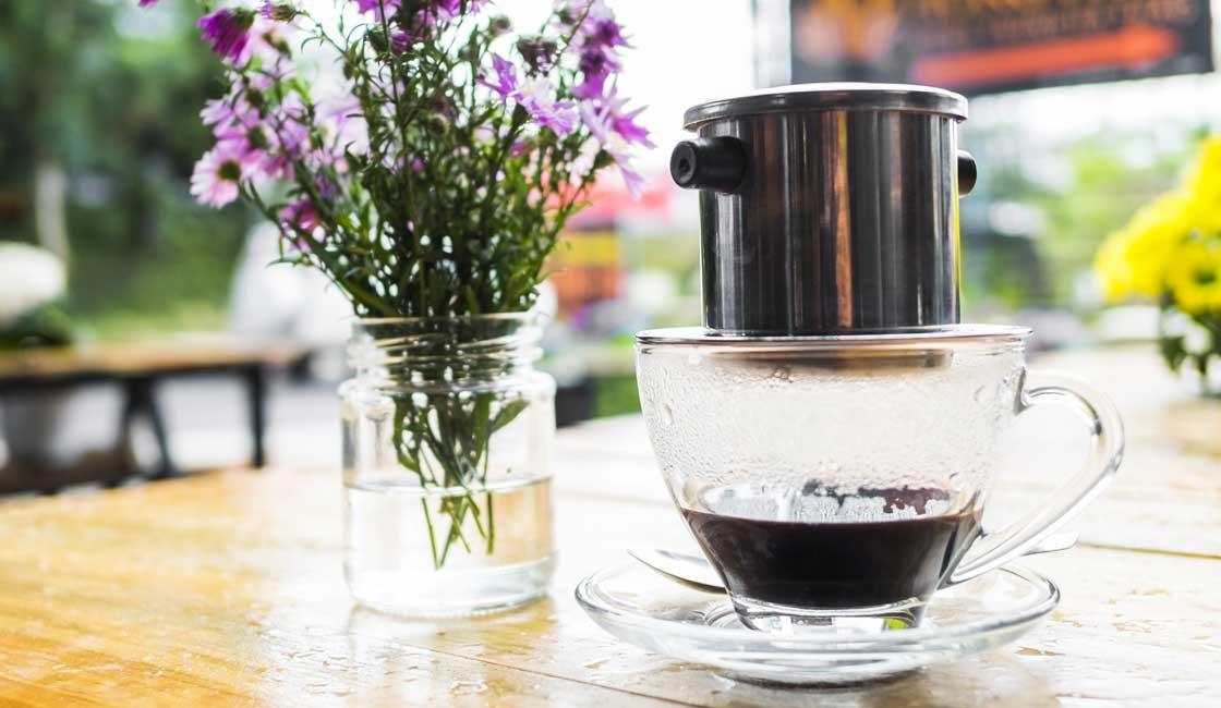 Coffee drip on a coffee cup