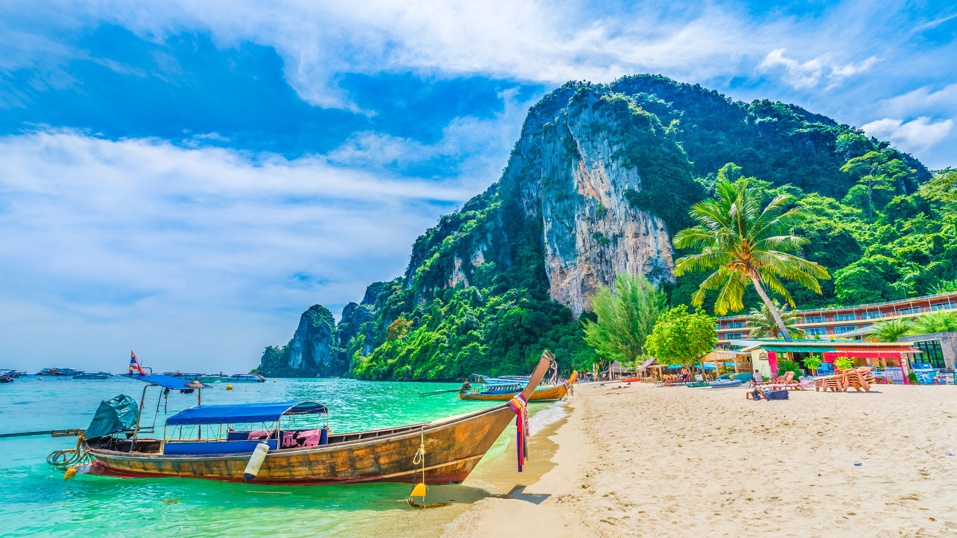 Long tail bpat on a beach in Thailand