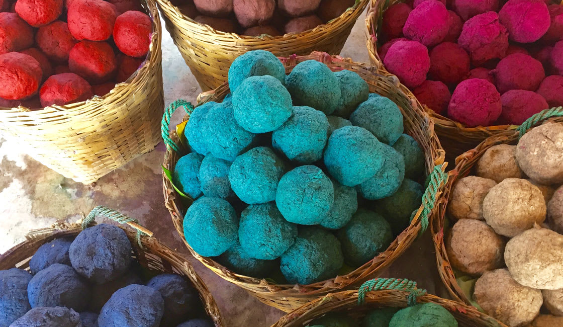 colorful mini stupas in a basket