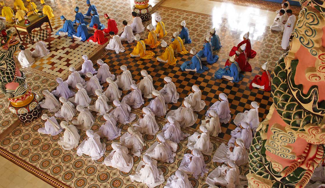 Worshippers on the floor of the temple