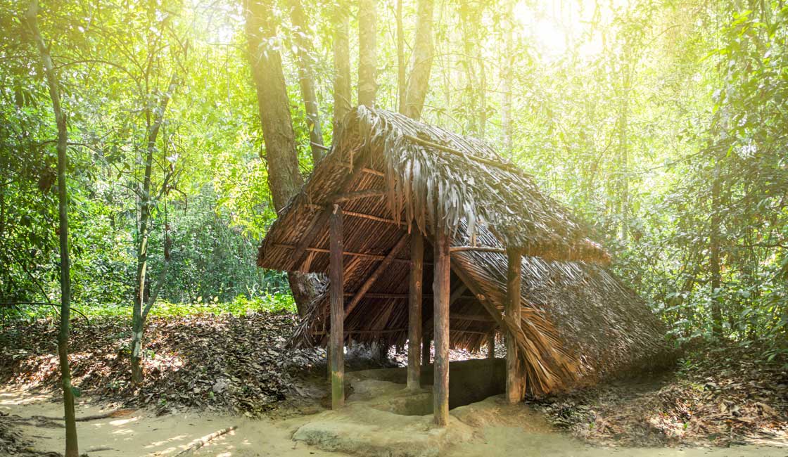 Entrance to the tunnel covered with straw roof