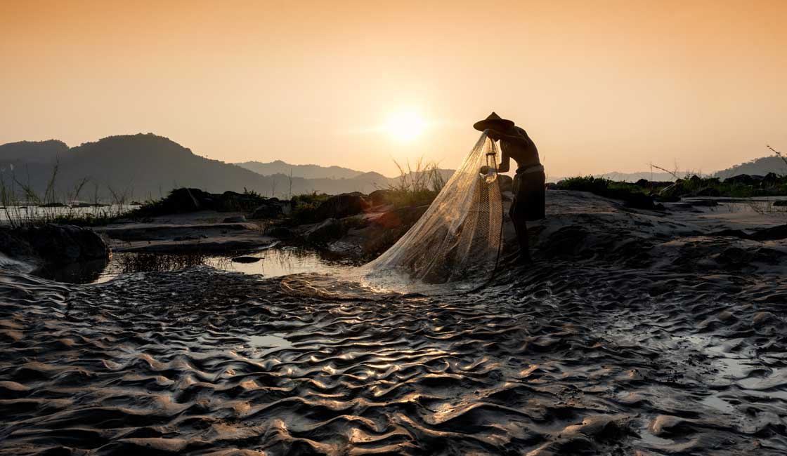 Fisherman at the Mekong