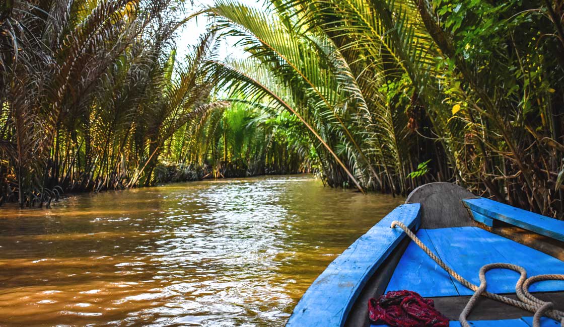 Sampan in the tropical canal