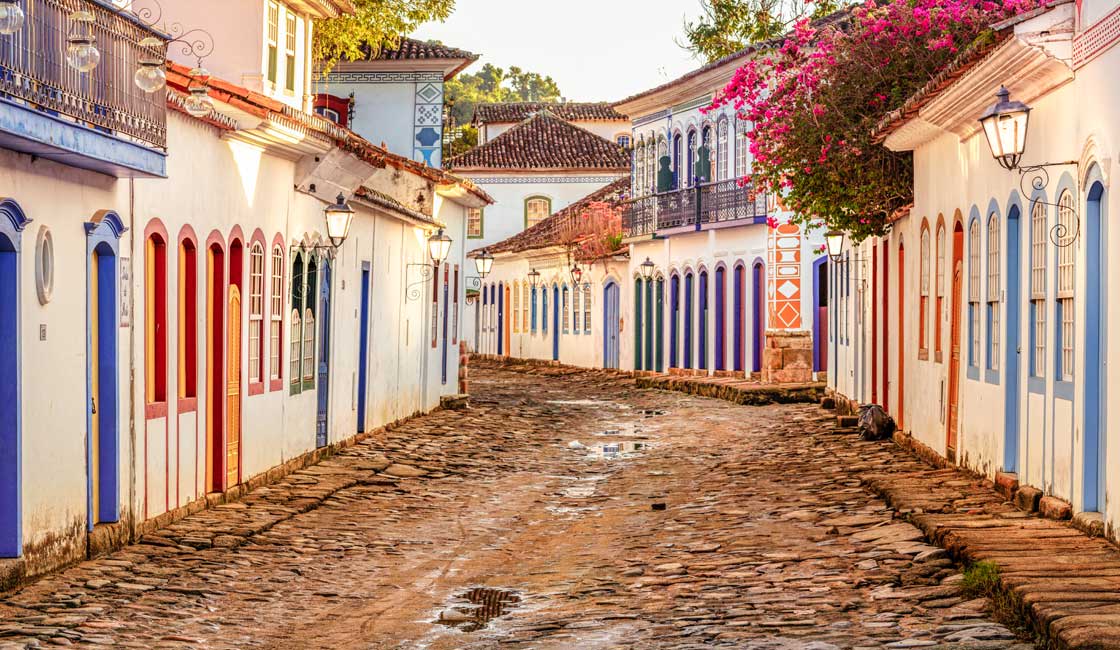 Cobblestone street and while houses