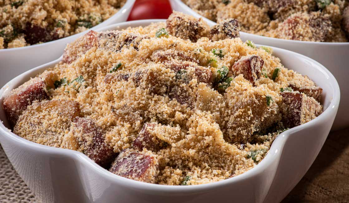 Bowl of fried bacon and onion with a layer of flour