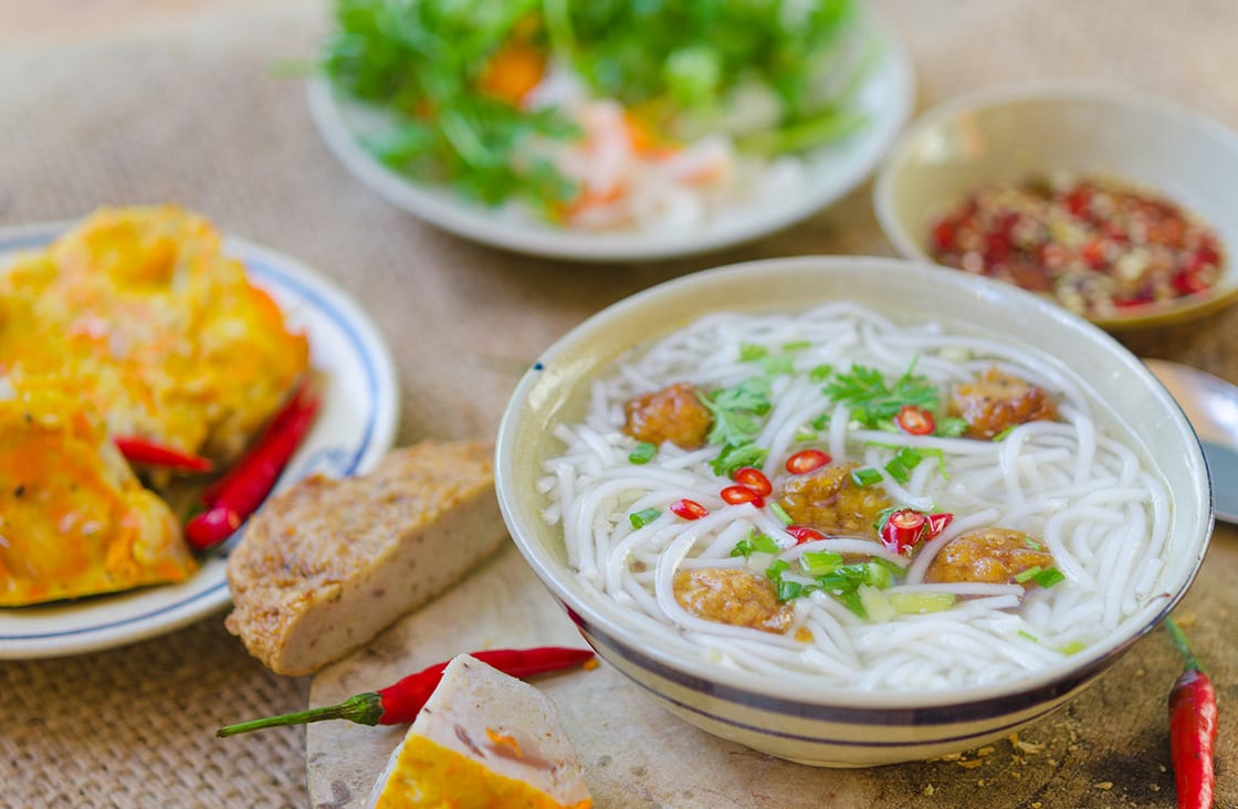 Banh Canh noodles with Baby Clams in Coconut Milk