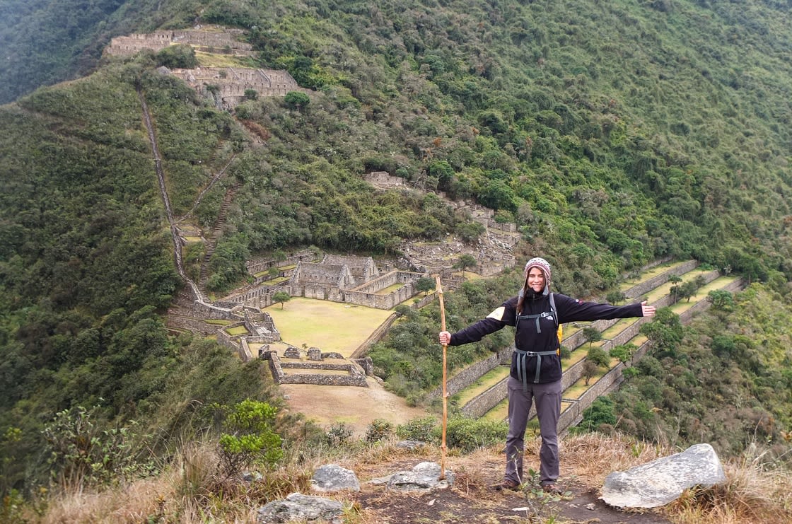 Hiker Celebrating Arrival At Choquequirao Ruins
