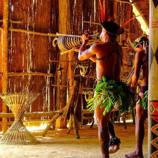 Indigenous man dancing