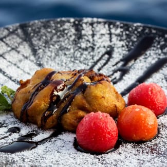 Dessert of fried banana and sorbet