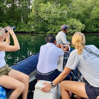 People on the skiff birdwatching