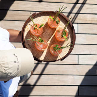 Waiter carrying drinks