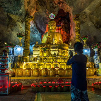 A person praying at the temple