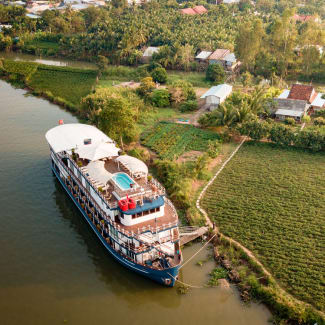 Ship by the bank from above