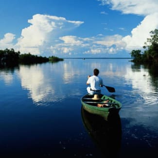 Canoe on the calm river