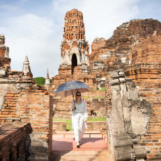 Woman wandering around the ruins