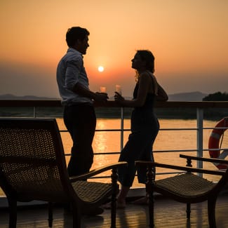 Couple at sunset on the deck