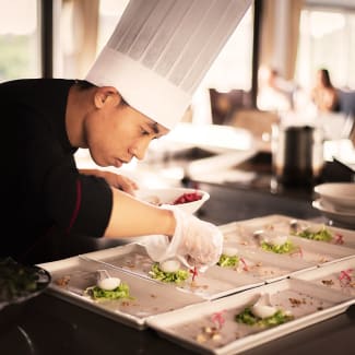 Chef preparing dinner onboard Ginger