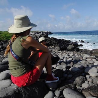 Woman on a rocky beach