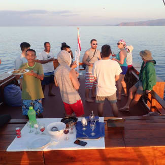 Group having sunset cocktails