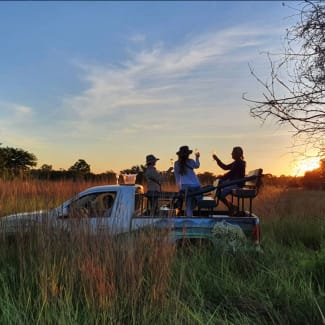 Young People on a jeep in nature