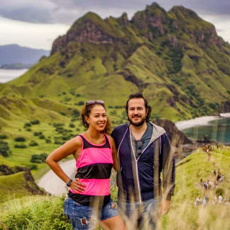 Couple standing with Padar in the background