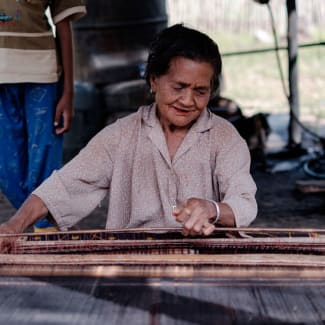 Old lady weaving