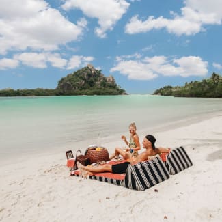 Couple relaxing on the beach