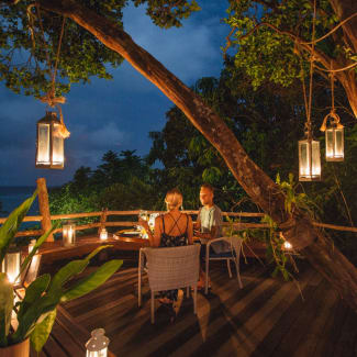 Couple having romantic dinner on a terrace