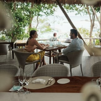 Couple having outdoor breakfast