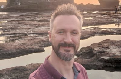 Jon at Tanah Lot, Bali, at sunset
