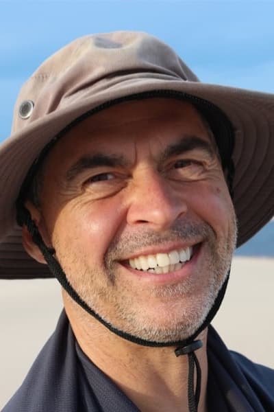 Happy Man Smiling On Beach