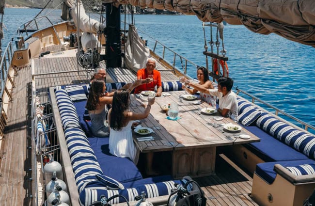 Group having a meal on the deck