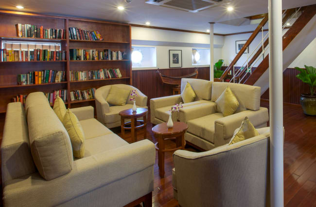 A library and reading corner onboard Mekong Pandaw