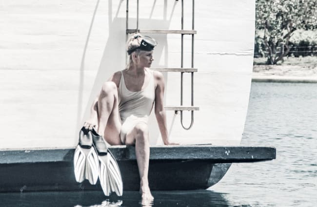 Woman sitting on the ships rear