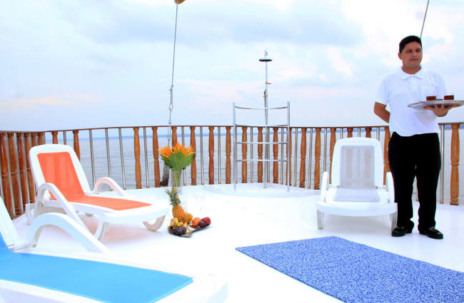 A waiter on the sun deck